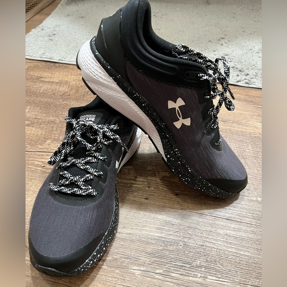 Black/White Under Armour Charged Tennis Shoes with Deluxe Foam insoles